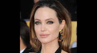 Angelina Jolie: Can be many things in my work, but I am very warm and gentle with my children