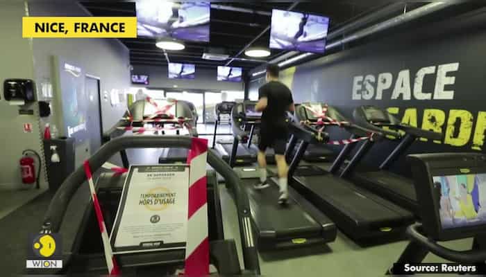 French gyms re-open with taped off running machines