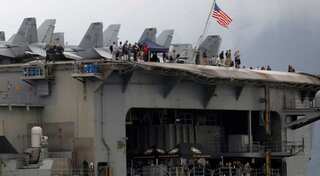 US ship back at sea after coronavirus outbreak and captain fired