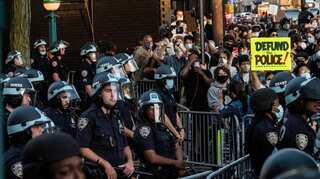 NYC police officer who shoved protester charged with assault