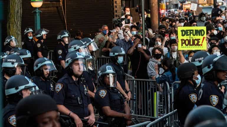 NYC police officer who shoved protester charged with assault