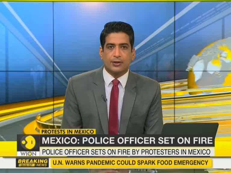 Mexico: Visuals of Police officer set on fire during protest