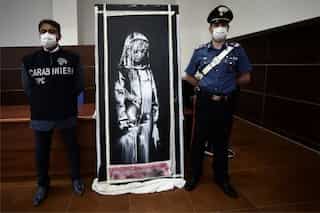 Banksy mural stolen from Bataclan theatre found in Italian farmhouse