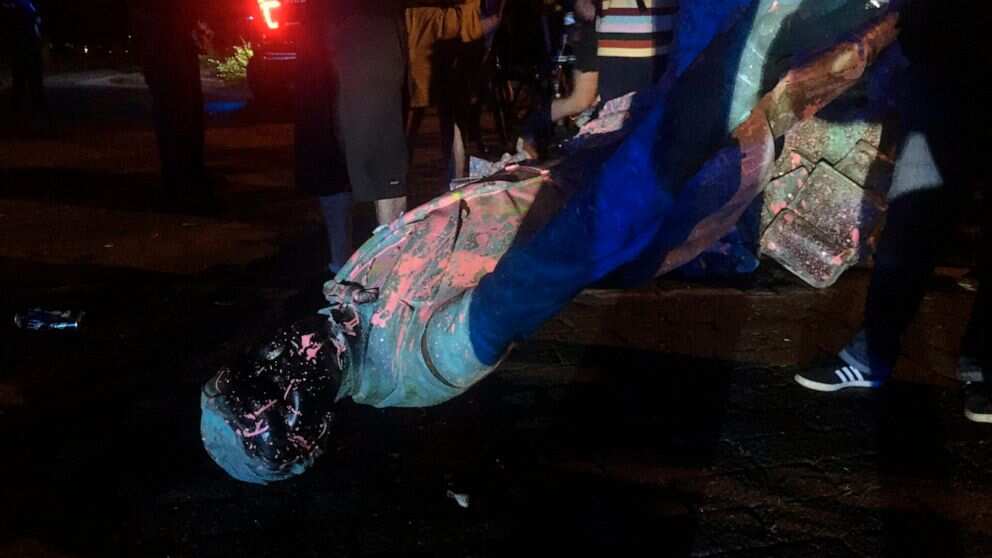 Anti-racism protestors topple statue of Confederate president in Virginia Anti-racism protestors topple statue of Confederate president in Virginia