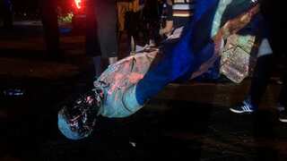 Anti-racism protestors topple statue of Confederate president in Virginia