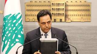 Lebanese PM blames opponents for unrest as protests enter third day
