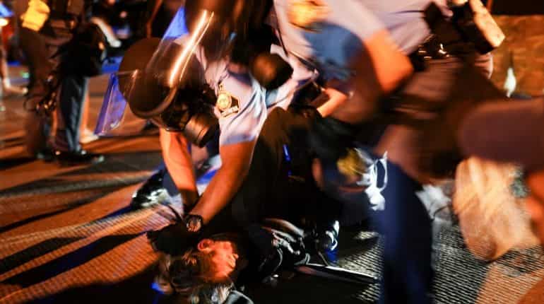 Demonstrators clash with police