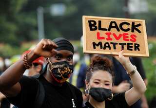 Black Lives Matter protesters march through Tokyo