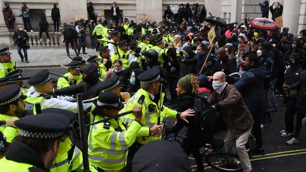 Man arrested on suspicion of urinating on London memorial