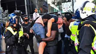 Top 10 world news today: Trump warns NFL players, Macron forbids removing statues and more