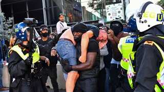 Top 10 world news today: Trump warns NFL players, Macron forbids removing statues and more