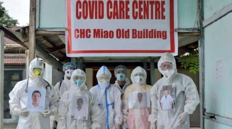 Smiling through PPE kits: Doctors put up smiling photos on PPE suits to destress patients
