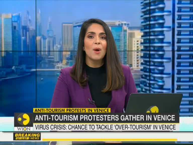 Human chain formed in protest against mass tourism in Venice | COVID-19