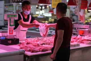 Now, China halts salmon imports over possible link to Beijing outbreak