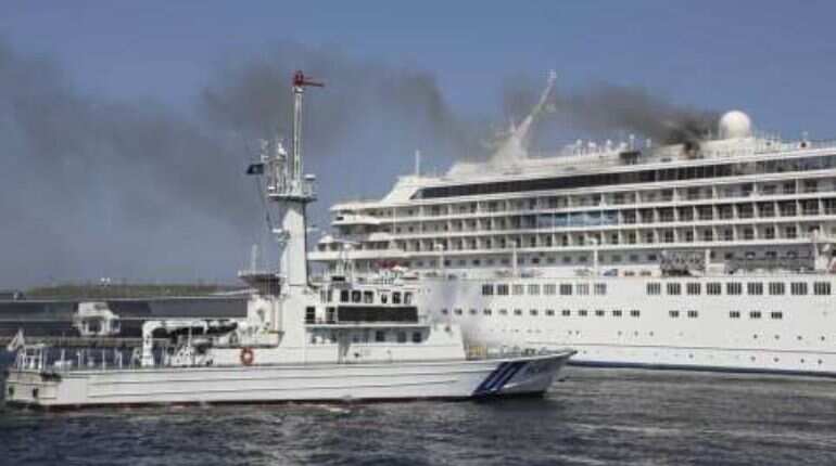 Cruise ship docked near Tokyo catches fire; black smoke billows Cruise ship docked near Tokyo catches fire; black smoke billows