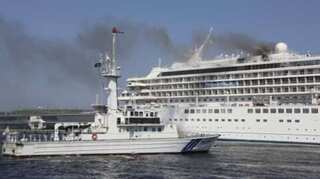 Cruise ship docked near Tokyo catches fire; black smoke billows