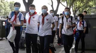 Beijing shuts schools again after coronavirus flares in city