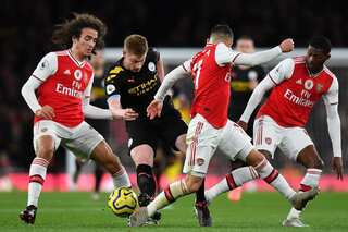 Aubameyang double fires Arsenal past Manchester City into Cup final