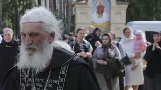 COVID-19 denying renegade priest seizes Russian monastery