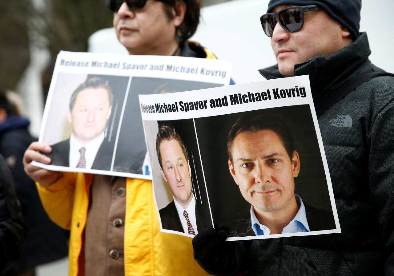 China charges two detained Canadians with suspected espionage