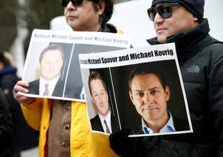 China charges two detained Canadians with suspected espionage