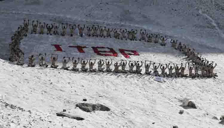 ITBP personnel perform yoga at Thiksey Monastery in Leh on International Yoga Day