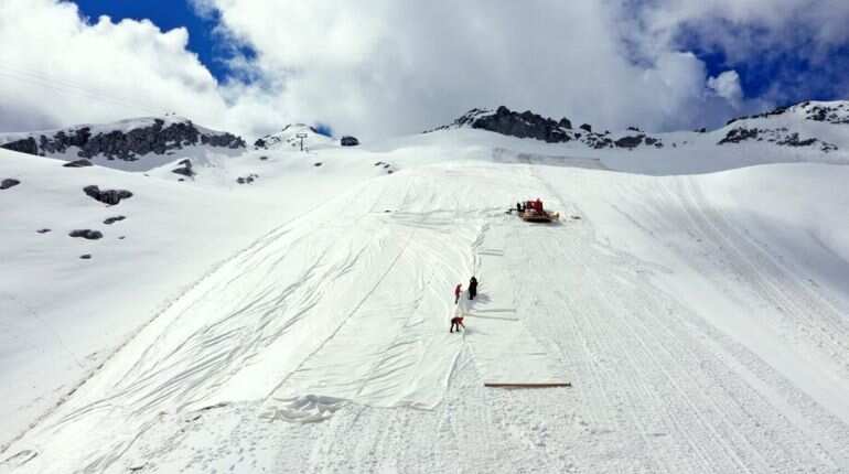 Italy's Presena glacier covered with white tarps to decelerate melting caused by climate change