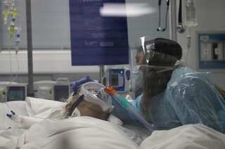 Chile hospital invites in COVID patients' families, gives them rare chance to say goodbye