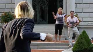 US couple draw guns on protesters passing their mansion