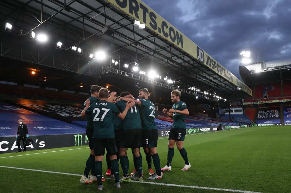 Mee winner at Palace fires Burnley into eighth