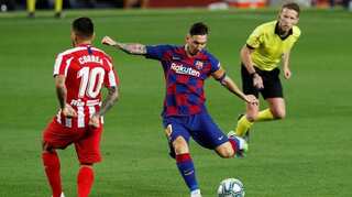 Messi scores 700th goal but Atletico draw hurts Barca's title hopes