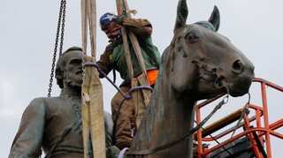 US: Richmond begins removing Confederate statues after mayor invokes emergency powers