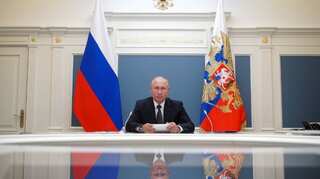 Russian President Vladimir Putin warns the world not to interfere in Belarus