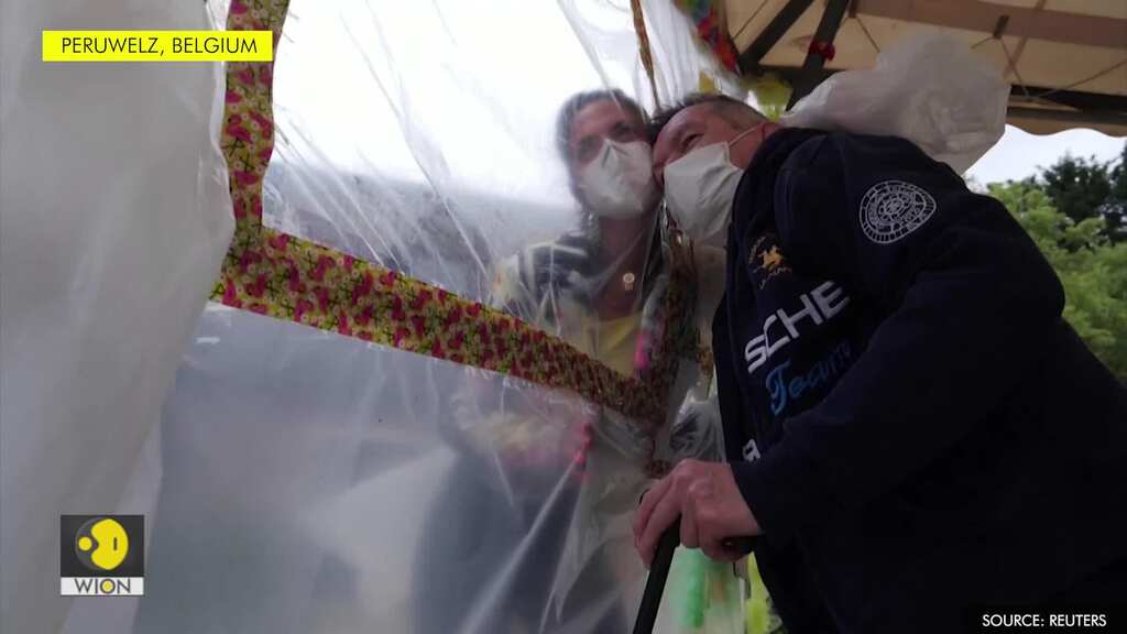 Belgian retirement home offers 'hug curtain' for safe embrace