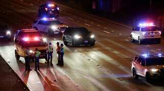 Two Seattle protesters hit by car on highway, one critically injured