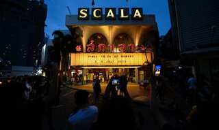 Fans gather for final showings at Thailand's much-loved La Scala theatre