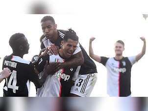 Ronaldo scores twice as Juve crush Messi's troubled Barcelona