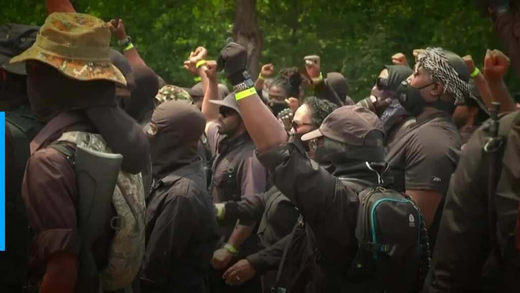 Black Armed protesters march through Confederate memorial park in Georgia