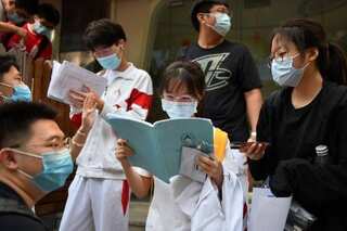 Nearly 11 million Chinese students take college exam after virus delay