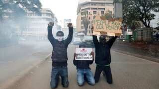 Kenyan police fire teargas, arrest marchers protesting at brutality