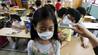 Hong Kong to close schools amid rise in COVID-19 cases