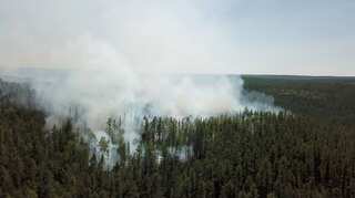 Russia seeds clouds in Siberia to douse raging wildfires