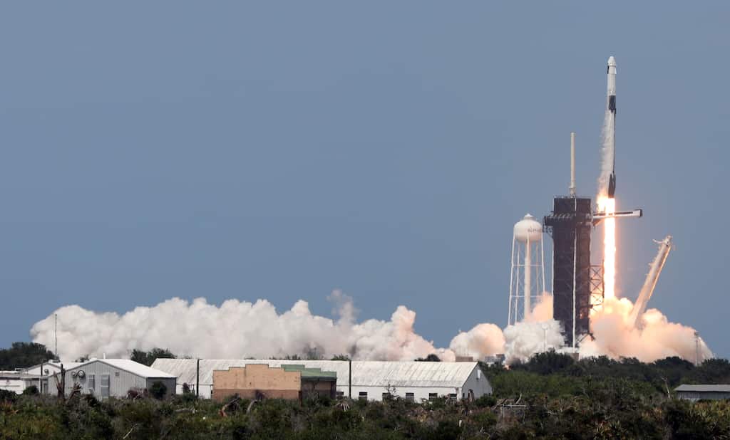 SpaceX delays launch of 57 mini-satellites