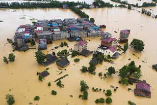 China raises flood alert to second highest level