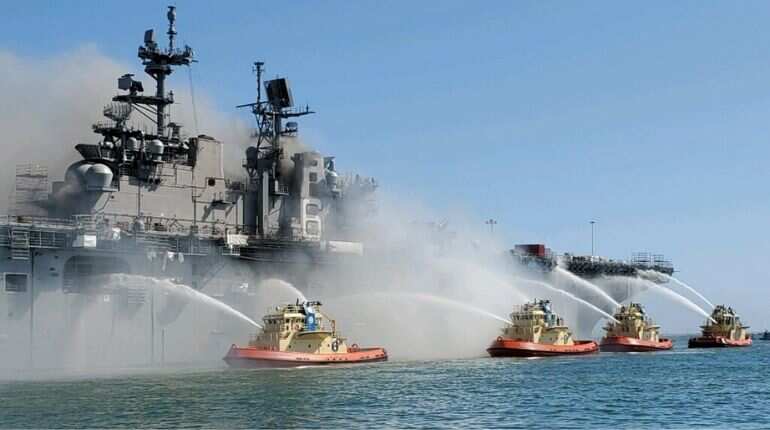 US Navy assault ship catches fire; 17 sailors, 4 civilians injured US Navy assault ship catches fire; 17 sailors, 4 civilians injured