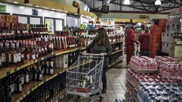 South Africa re-instates curfew, booze ban as coronavirus cases spike