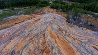 Russia launches investigation for pollution after streams run orange