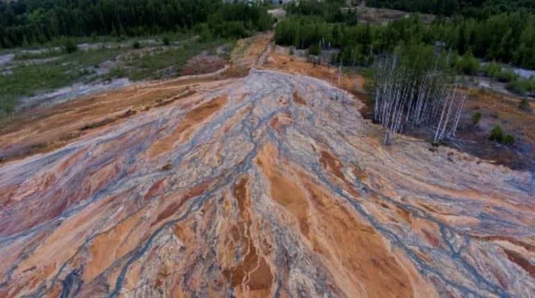 Russia launches investigation for pollution after streams run orange