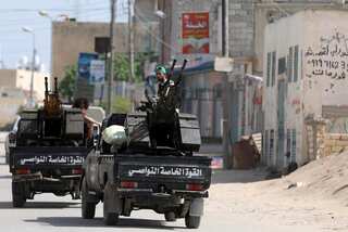 France, Germany, Italy threaten sanctions over arms for Libya