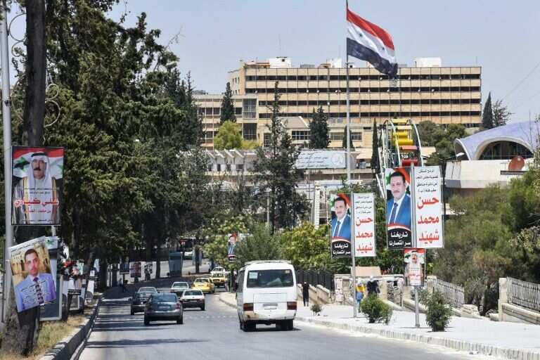 Syrians vote for new parliament amid war, economic turmoil